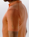 STATE OF ART ATELIER POLO GEBREID MERINOWOL ORANJEROOD