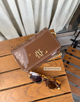 JOSH V TAS RAIZA MET LOGO BROWN